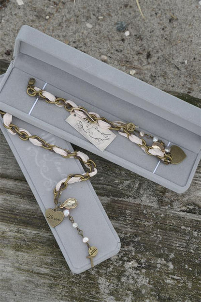 Jeanne d Arc Living Armband Antikgold Rosa